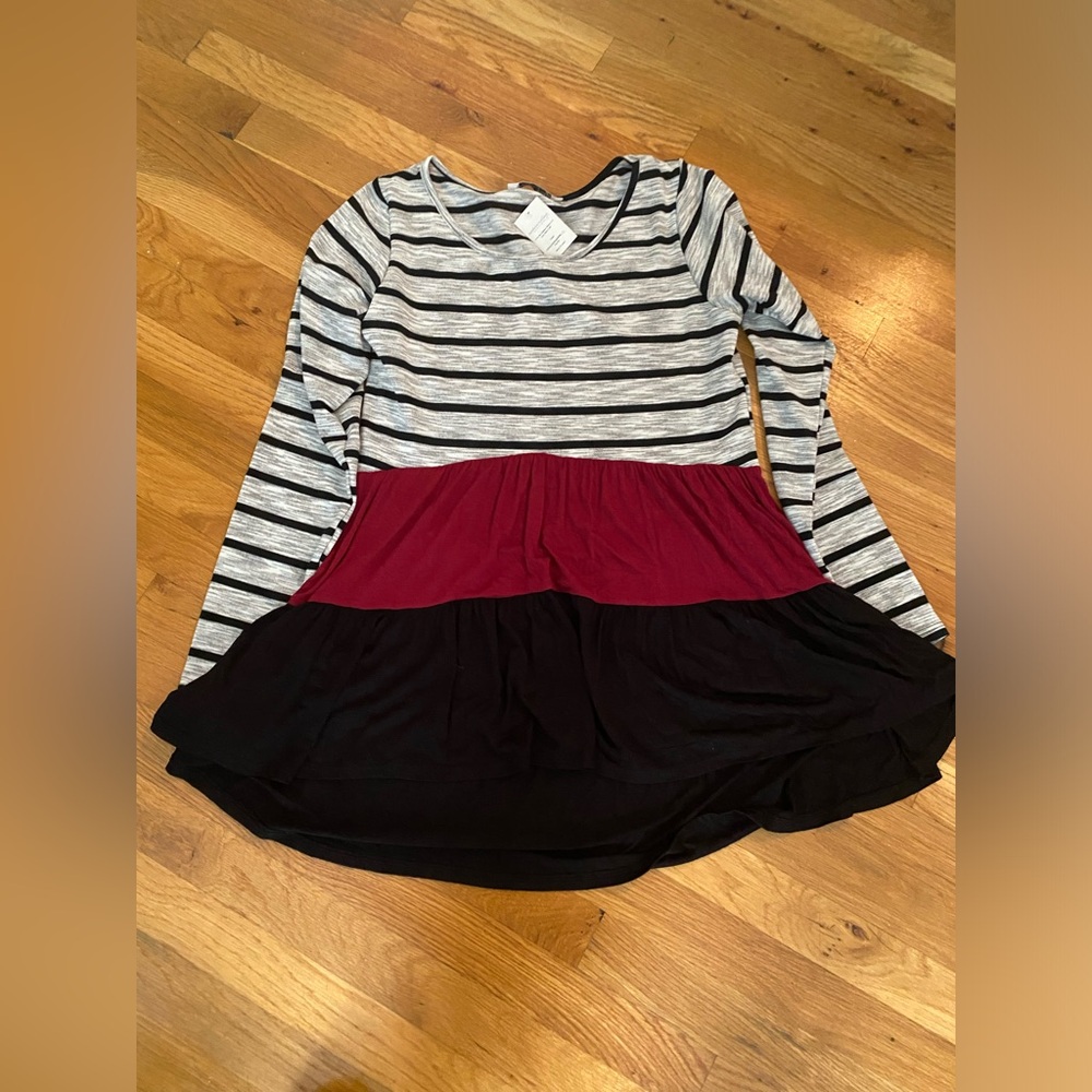 I’ll go the distance, stripes and color block ruffle top
